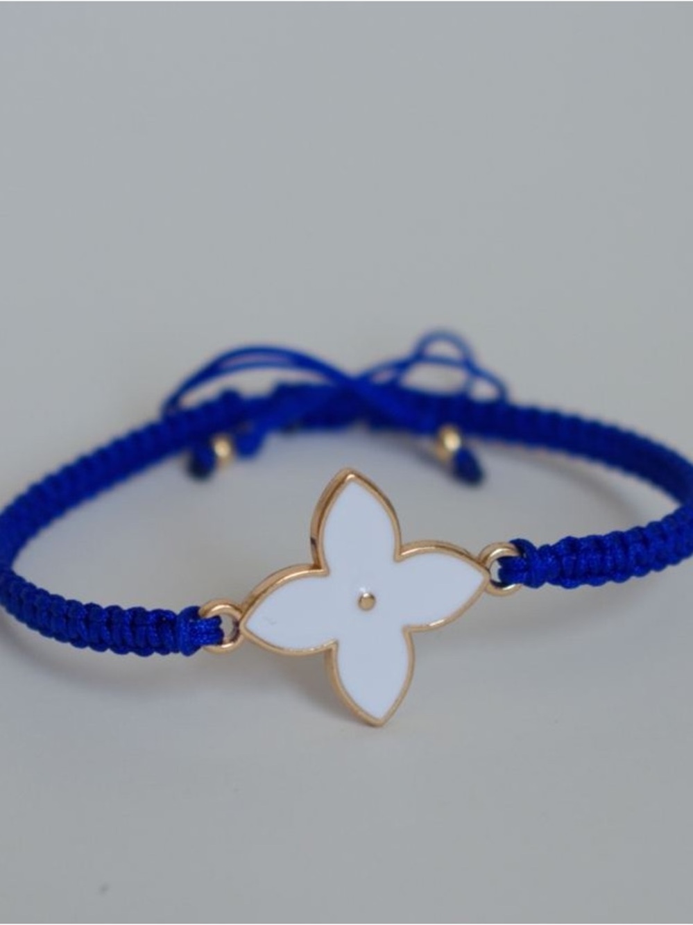 Gold & White Floral Charm Macramé Bracelet in Royal Blue